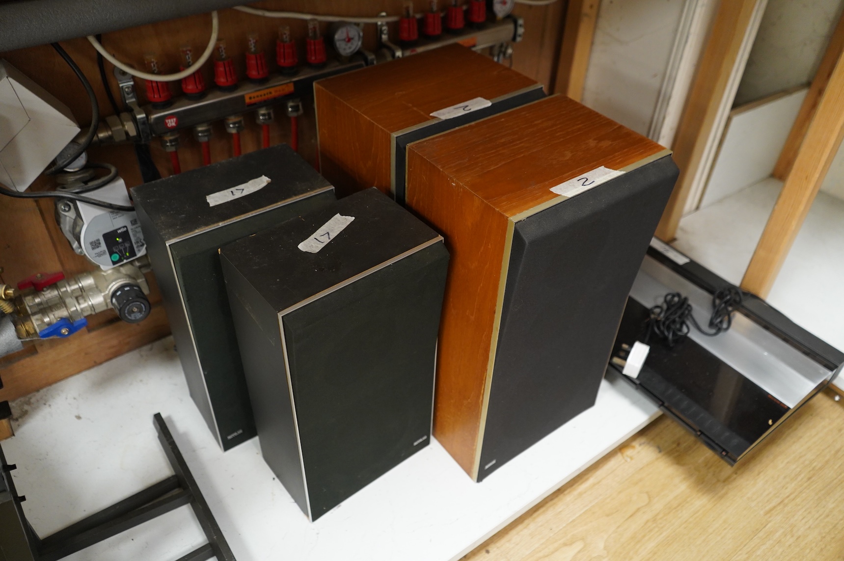 A collection of Bang & Olufsen stereo equipment, including; a Beocentre 2200 together with a pair of the related Beovox X25 speakers, plus a pair of Redline R60 floor standing speakers with their stands, and a pair of Be